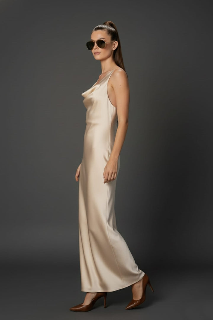 Model walking in cowl neck crisscross open back maxi dress, Shahida,