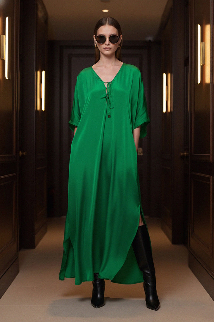 green-silk-kaftan, vacation-outfit, fashion-dress, luxury-wear, stylish-kaftan, elegant-green-dress, trendy-outfit, casual-chic, chic-style, long-green-dress, modern-fashion, fashion-forward, relaxed-look