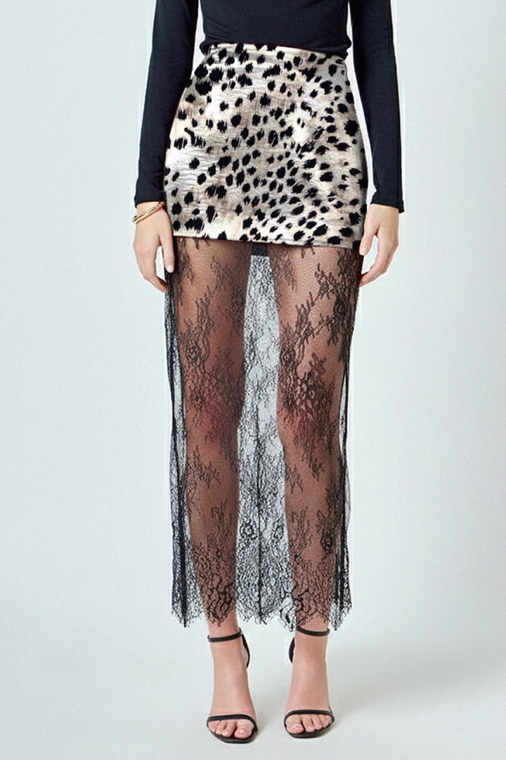 Shahida Parides,
Dressy casual skirt style,
Minimalist evening fashion,
Layered lace detailing,