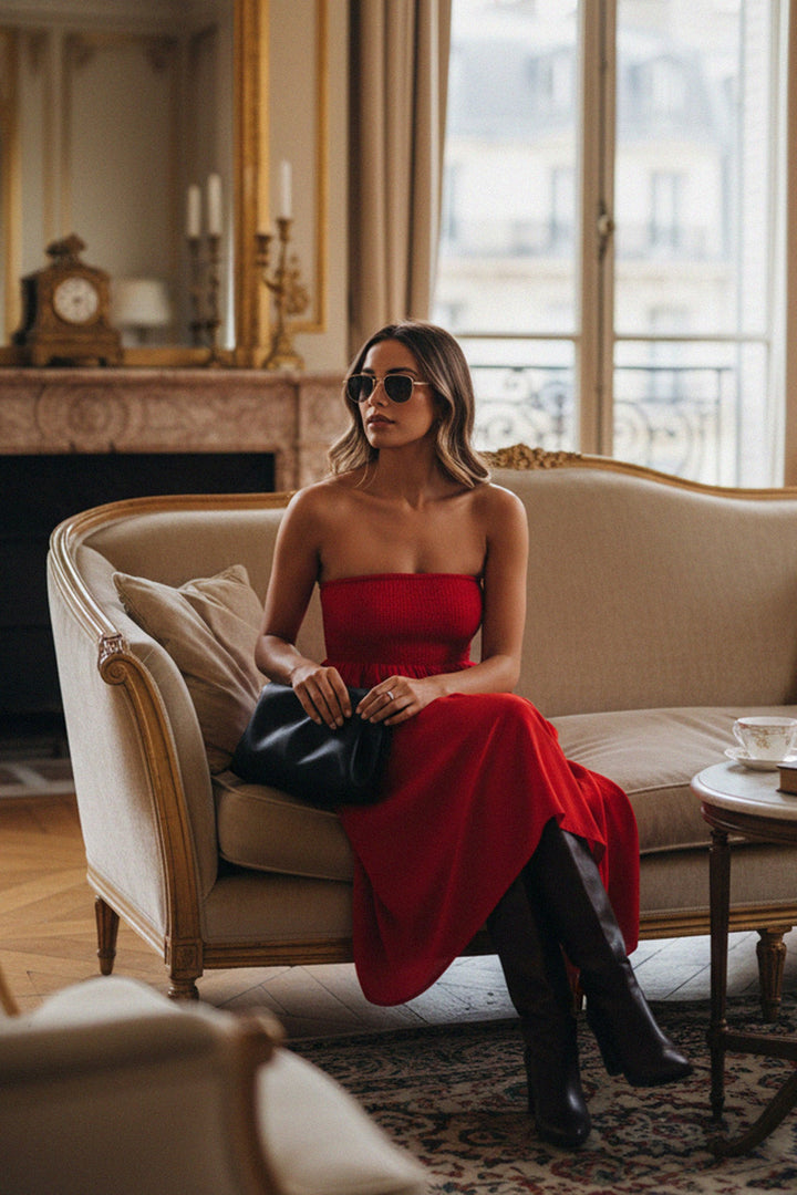 Trendy red strapless dress in a Paris street style look, perfect for fashion-forward women and travel outfits.