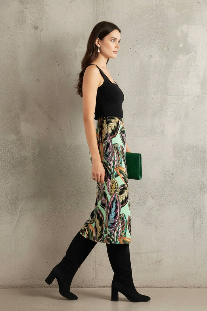 right pose model, shahida parides, vegan silk skirt, leaf print green, elegant posture, modern outfit
