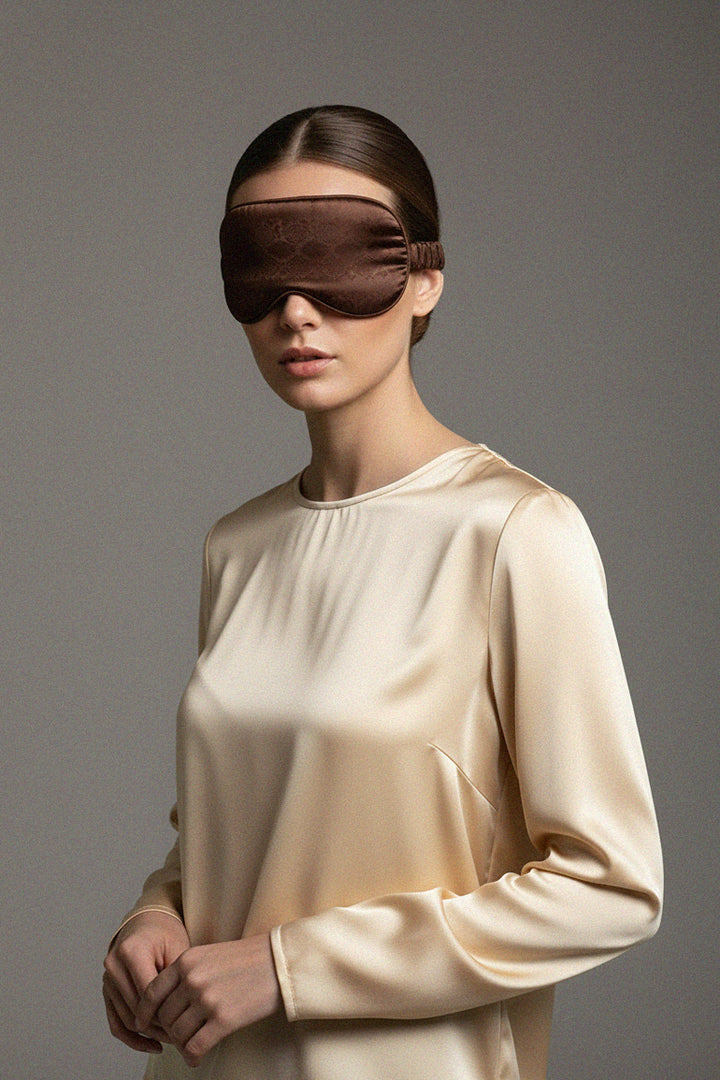 soft elegance, sleep gear, eco textile, warm drink, lounge style, serene mood, natural palette