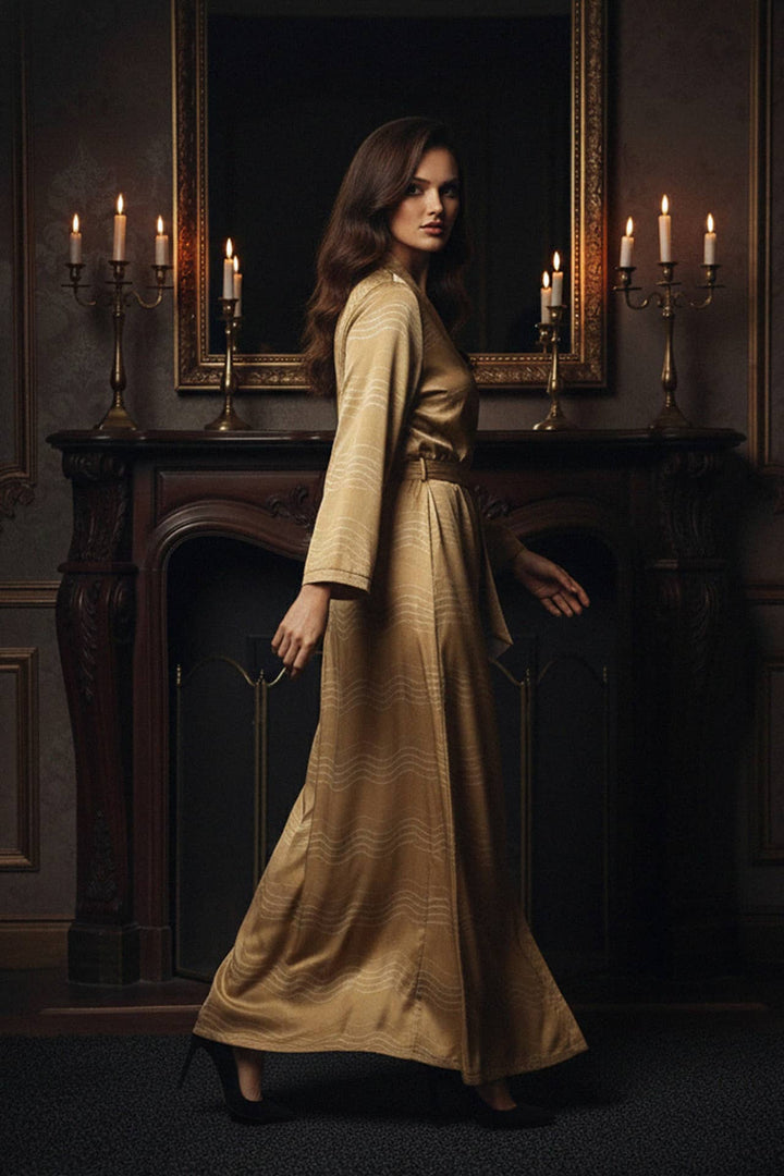 long kimono, gold robe, elegant stripes, luxe setting, candle backdrop, stylish edit, glamour tone