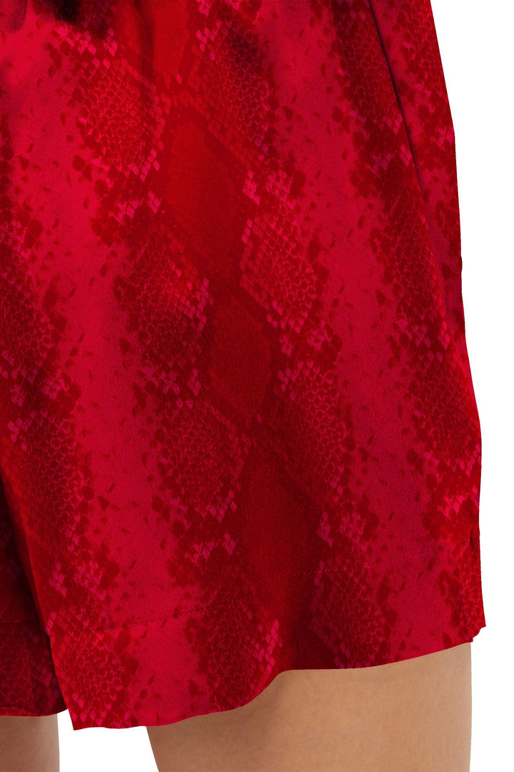 shahida-kyle-richards, vegan silk cupro, red fashion shorts, sustainable luxe style, blood stone shade, resort-ready look